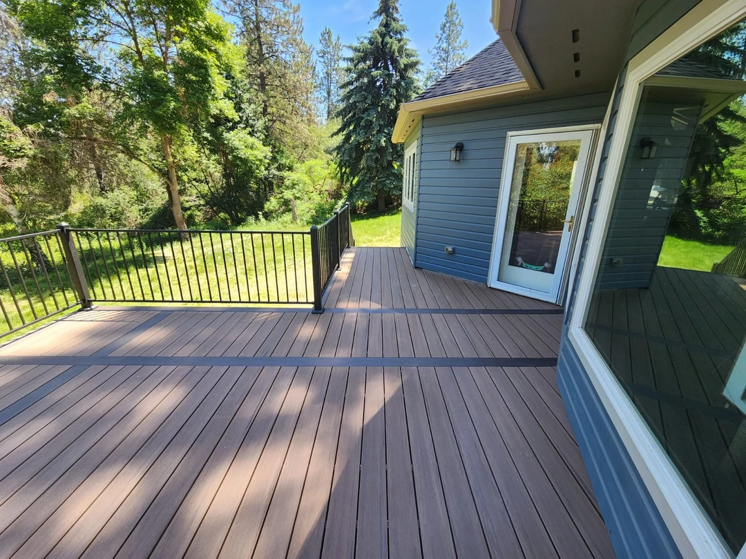 Deck with black railing.