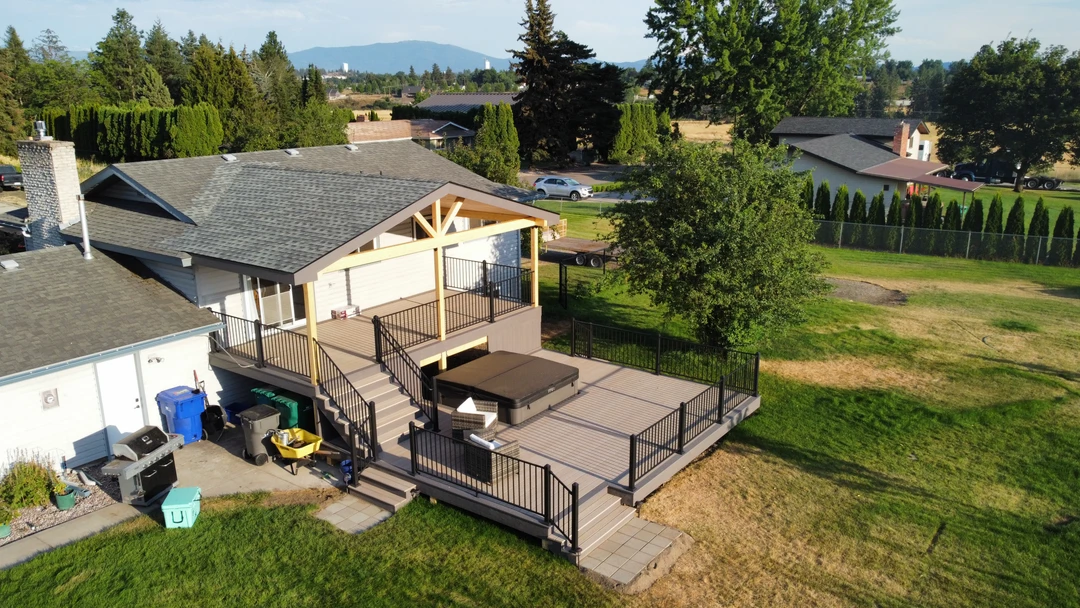 Deck with railing and stairs.